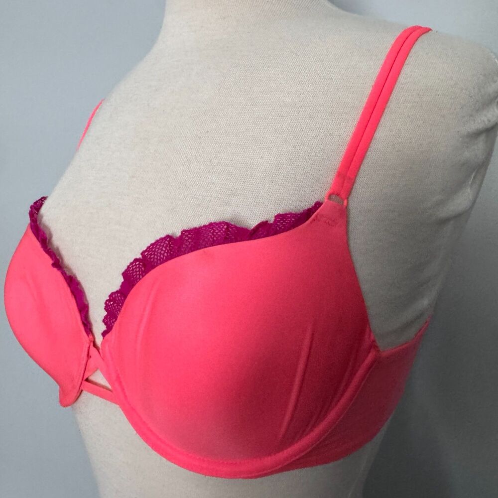 Victoria's Secret slight push-up demi bra in neon pink with purple lace trim